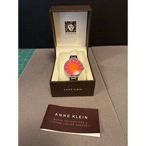 Anne Klein Stainless Steel Quartz Womens Watch  White Leather Band  Pink-Orange